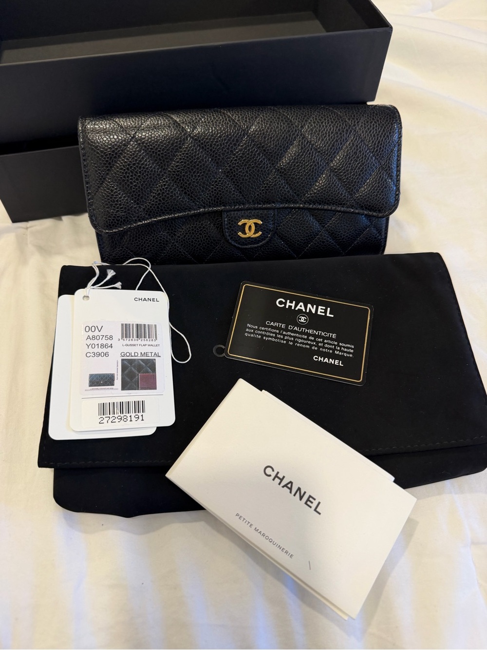 CHANEL Black Quilted Caviar Leather Wallet with Gold CC